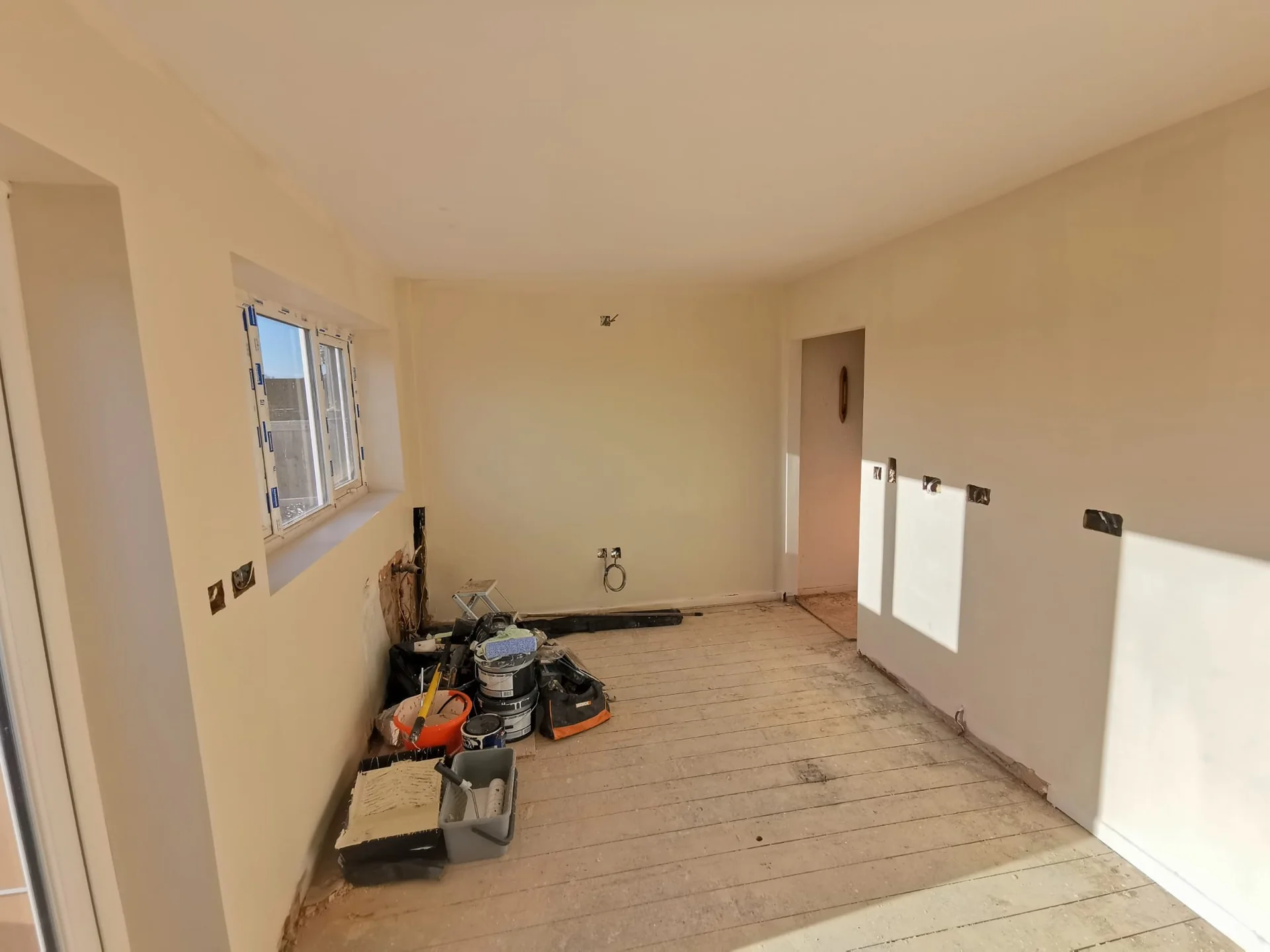 Kitchen walls after plastering and painting